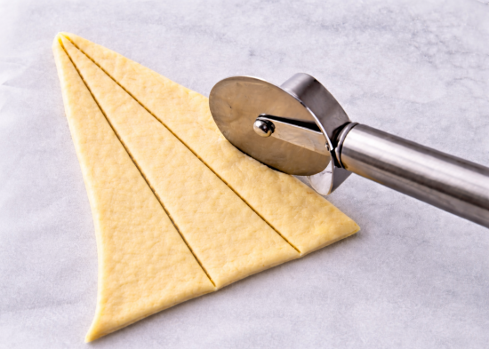 Crescent dough cut into 3 strips